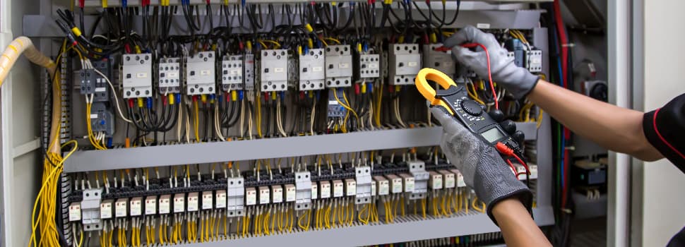 technician working on power distribution box