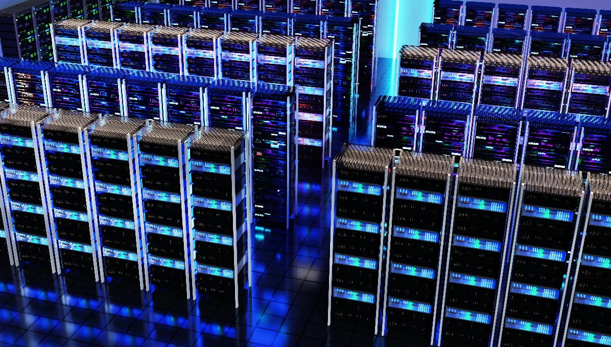 Rows of enterprise server racks inside a modern data centre, providing secure, high-capacity computing infrastructure for reliable digital services and data processing.